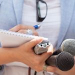 reporter holding mic